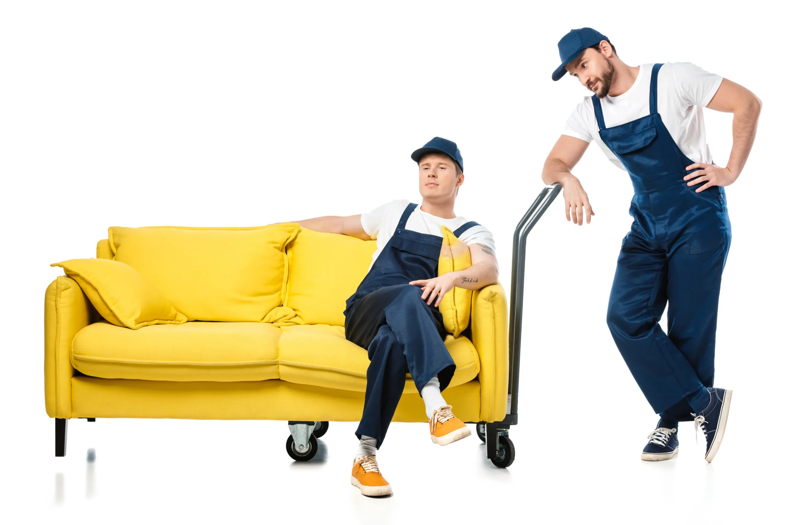 Furniture movers in Dubai 2 professional furniture movers in Dubai sitting on a sofa while moving