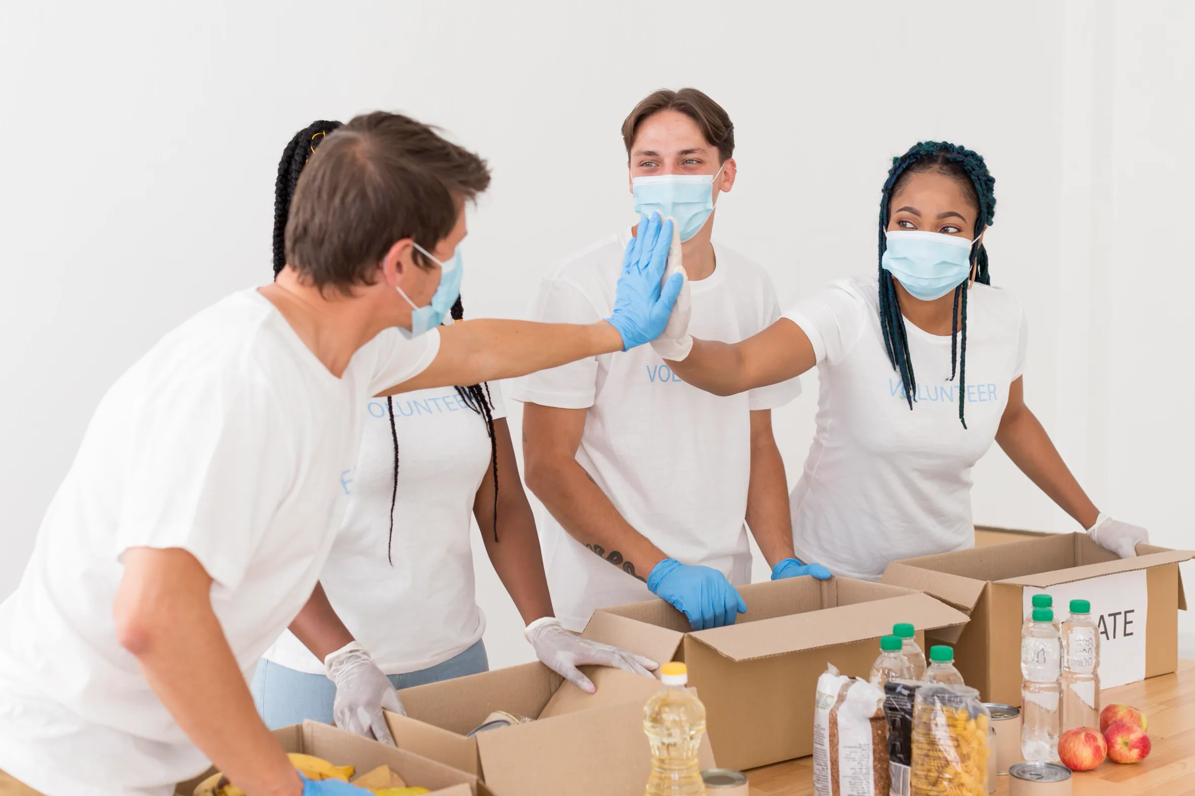 A team of professional movers is moving medical equipment from an office
