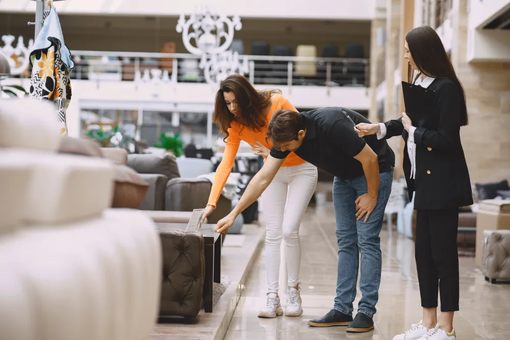 A couple visiting a furniture storage facility